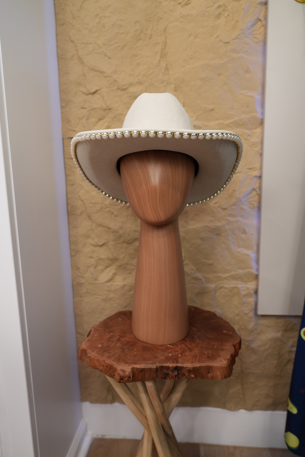 White hat with jewelry and pearls